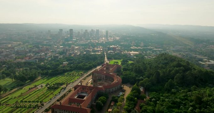 Majestic Union Buildings captured with Pretoria's typical downtown skyline. Establishing shot of South Africa capital landmark cityscape. 4K drone zoom in video with Downtown Skyline