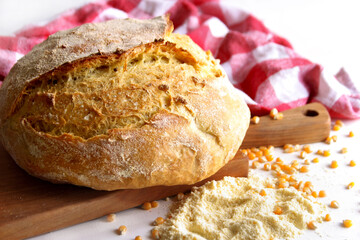 Fresh baked cornbread on a cutting board
