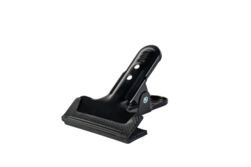 Black plastic spring clamp isolated on transparent background.