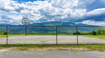 Side profile of a basketball court fence, hoop barely visible in distance