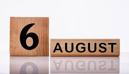 Minimalist photo of wooden blocks with date 6 August. Day and month, calendar on white background