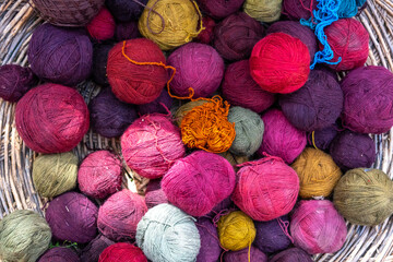 Traditional Peruvian textile dyes and colorful wool balls from natural pigments