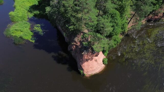 Red cliffs Latvia, Salaca River, salmon fishing