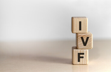 IVF - text on wooden cubes text on a background