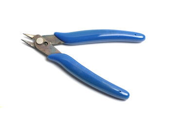 Blue cutting pliers for cutting wire, cable or plastic on isolated orange background, commonly used for cutting cables