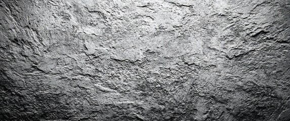 Grey stone texture shows a rough, uneven surface in a gradient