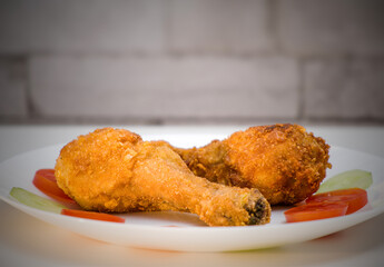 Crispy Fried Chicken Legs on a Plate