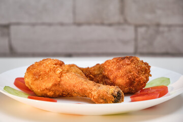 Crispy Fried Chicken Legs on a Plate