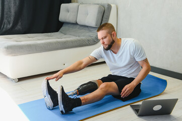 Man amputee with prosthetic leg disability on transfemoral leg prosthesis artificial device making...