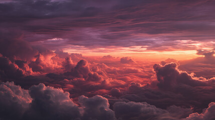 A breathtaking panoramic photo of sky with thick rolling clouds, illuminated with rich amber and violet tones, scattered light rays filtering through