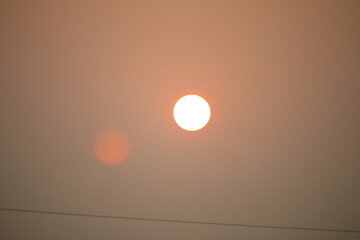 Beautiful sunset through branches, Sunset, Warm sunset passing through branches, Sun shining through the leaves in the forest, Sunset Concept.