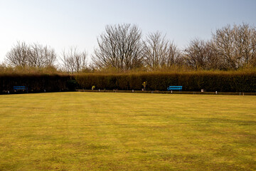 Rural Village Bowling Green Needing Attention in Early Spring