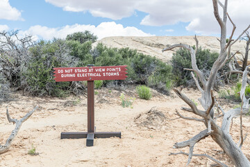 Warning sign about electrical - lightning Storms  in Natural Bridges National Monument, Utah, USA