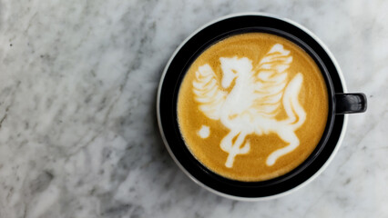 a cup cappuccino on marble table