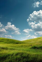 Obraz premium Green Grass Hills Under Blue Sky with White Clouds Landscape