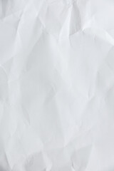 Crumpled paper texture crease natural background authenticity imperfection white sheet smooth matte paper unmarked symbolizing purity minimalism plain surface Paper art highlights organic fibers grain