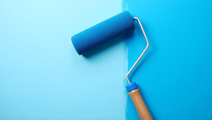 Fototapeta premium Photograph of a paint roller with a blue handle and a blue roller head, placed against a wall painted in a light blue color.