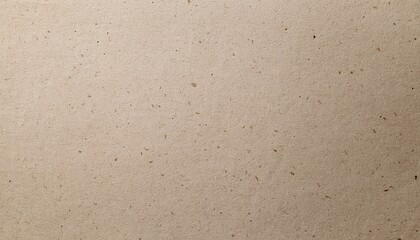 Textured Brown Paper Background: A close-up texture shot of a natural brown paper background with a subtle flecked texture. Ideal for crafting and design projects.