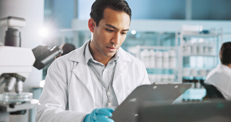 Scientist, man and clipboard with checklist in laboratory for medical research, clinical trial and...