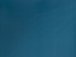 Dark blue fabric cloth polyester texture and textile background.