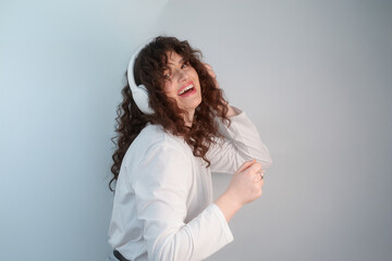 Fototapeta premium Sound healing: Woman finds inner balance through movement and melodies of her favorite songs.