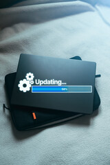 Updating progress bar on laptop. Installing app patch. Software update or operating system upgrade...