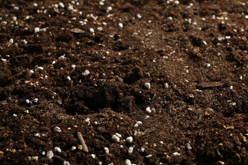 Texture of fresh soil as background, closeup