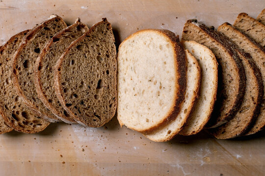 Sliced White and Brown Bread Loaves