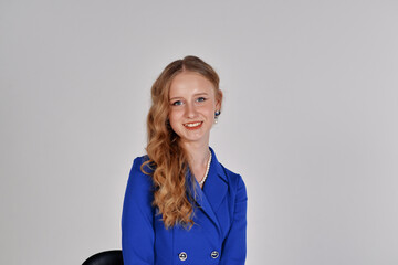 Elegant woman in a blue blazer dress