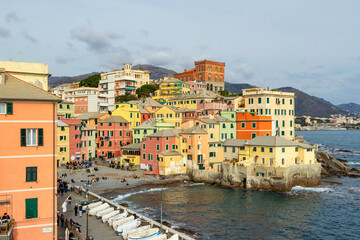 Fototapeta premium Panorama of the fisherman village of Boccadasse, on the eastern outskirts of the city of Genoa (Ligurian Region, Northern Italy); It is a famous place of visit for many tourists.