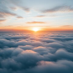 Aerial View of a Breathtaking Sunset Over a Sea of Clouds with Warm Light and Soft Colors Creating a Peaceful Atmosphere