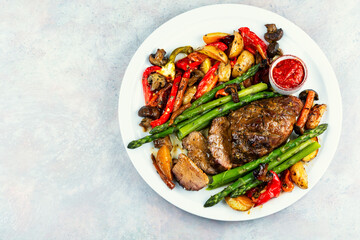 Roasted duck breast with vegetables.