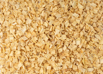 Dry parsley root texture background, dried diced celery cubes pattern, small liquorice pileces...