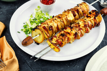 Grilled vegetable bacon kebabs.
