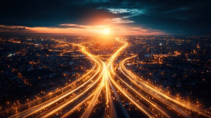 Aerial view of city highway intersection at sunset.