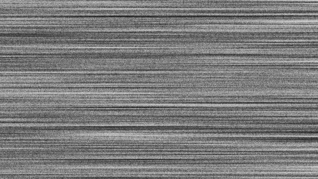 Television screen showing static noise suitable for video editing projects, commercials, broadcast design, or illustrating technical difficulties in presentations.

