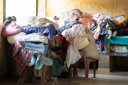 Dhobi Ghat, open air laundry in Kochi, India, pile of dirty clothes, washing bedsheets and linen