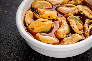 Mussels canned seafood appetizer dish organic product fresh tasty gourmet food background on the table rustic food top view copy space keto paleo pescetarian diet vegetarian food