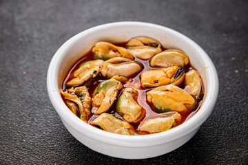 Mussels canned seafood appetizer dish organic product fresh tasty gourmet food background on the table rustic food top view copy space keto paleo pescetarian diet vegetarian food
