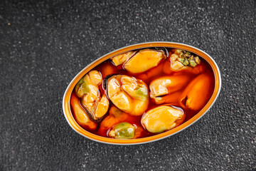 Mussels canned seafood appetizer dish organic product fresh tasty gourmet food background on the table rustic food top view copy space keto paleo pescetarian diet vegetarian food