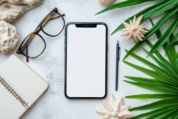 On a clean, bright surface, a stylish tablet sits, bordered by lively green leaves. Chic glasses and a minimalist notebook adorn the workspace, fostering creativity and focus