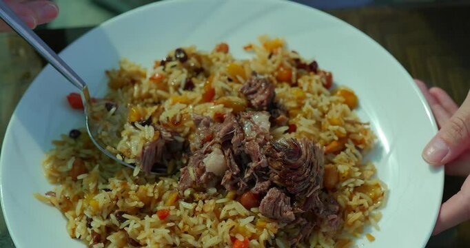 Traditional Uzbek Plov with Meat and Vegetables
