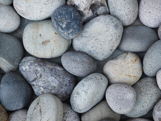 Stones of various shapes and sizes in a Japanese shrine.