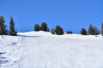 Scenery of French alps slopes by winter