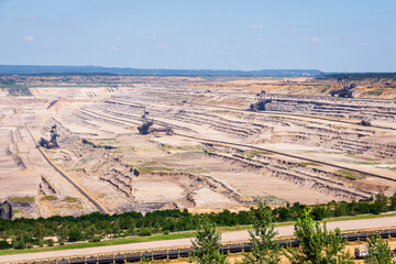View over the Hambach coal mine, a huge open-pit mine in the west of Germany, operated by RWE and used for mining lignite with giant bucket-wheel excavators.