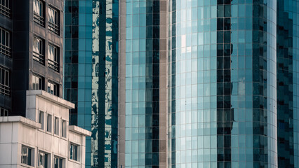 Fototapeta premium many windows and walls facade of a modern skyscraper without people