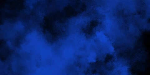 Abstract smoke in dark background. Texture and desktop picture .background with particles in the form of blue smoke .dramatic sky with clouds on blue background .background with copy space for design.