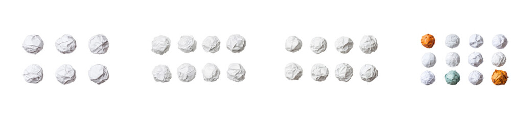 Crumpled paper balls arranged in a pattern on a transparent background