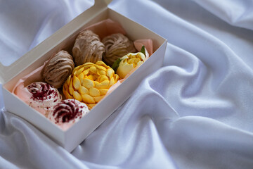 Colourful handmade flower shaped marshmallows