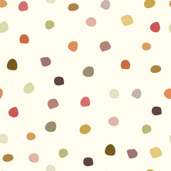 Hand drawn polka dots different colors on light background. Vector illustration